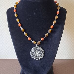 Elegant Brown and Orange Beaded Medalllion Necklace.